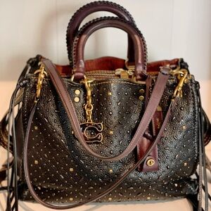 SOLD…….Coach 75th Anniversary Rogue 31